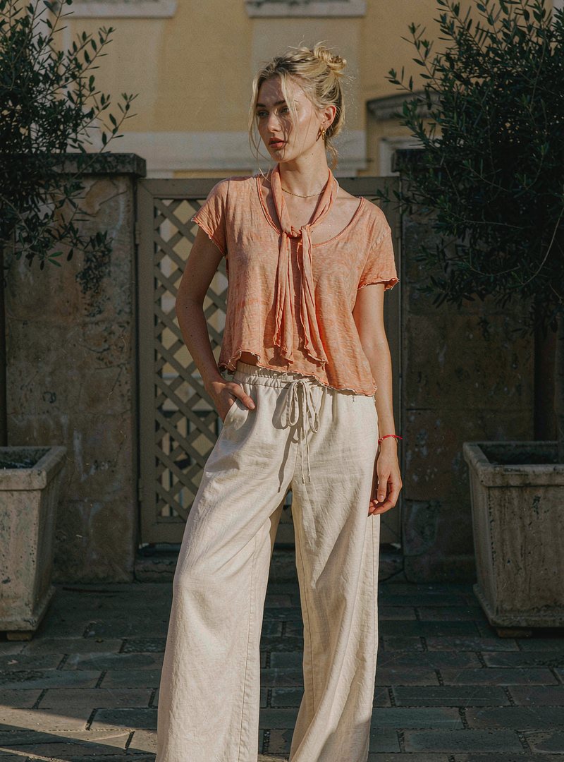 Isola Short Sleeve Blouse — Sunfade, modelled outdoors