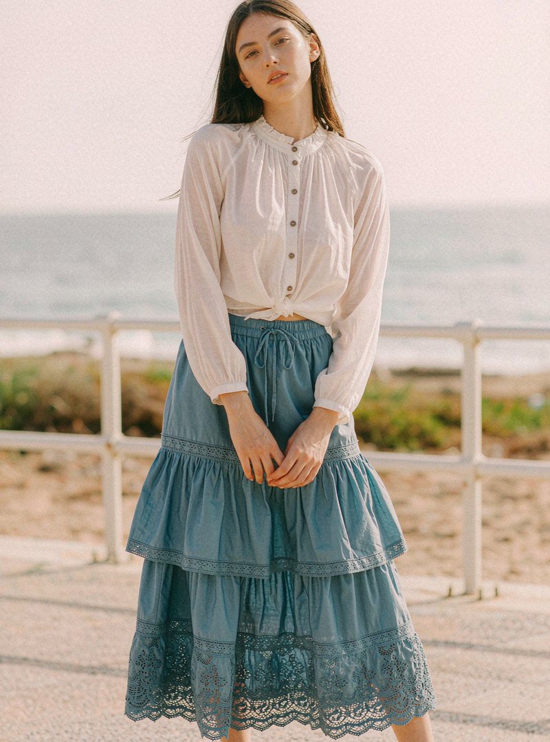 Viola Lace Trim Midi Skirt — Lagoon, modelled outdoors